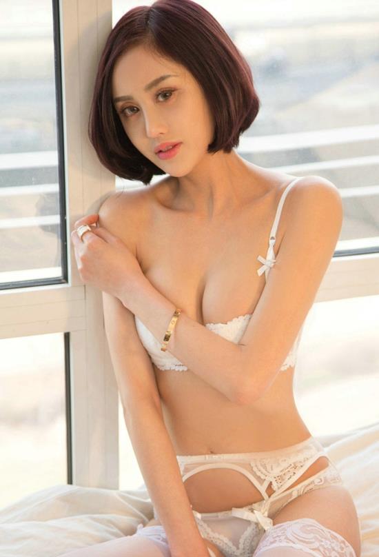 只戴乳贴的美女 写真(4)(点击浏览下一张趣图)