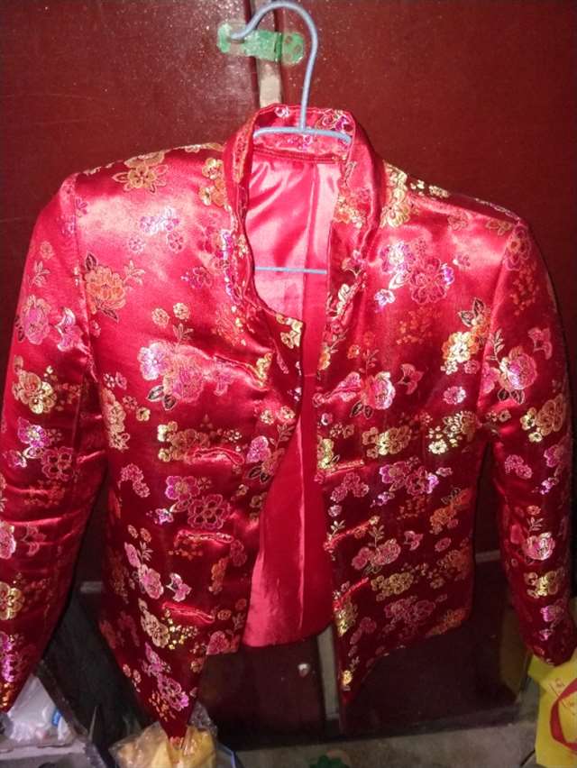 查看穿红缎棉袄的媳妇 你媳妇那两件棉布袄真不错