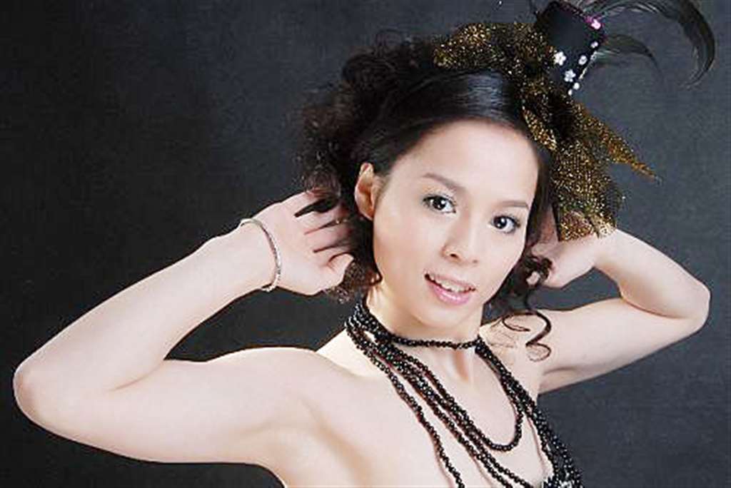 黄珊汕每年都要拍一套艺术照,外出比赛都要拍照留念.